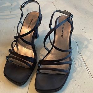 Unlisted Women’s Black Strappy Heel, Size 8. buckle closure